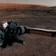 Curiosity’s robotic arm and Mount Sharp are visible in this cropped image from the new panorama.